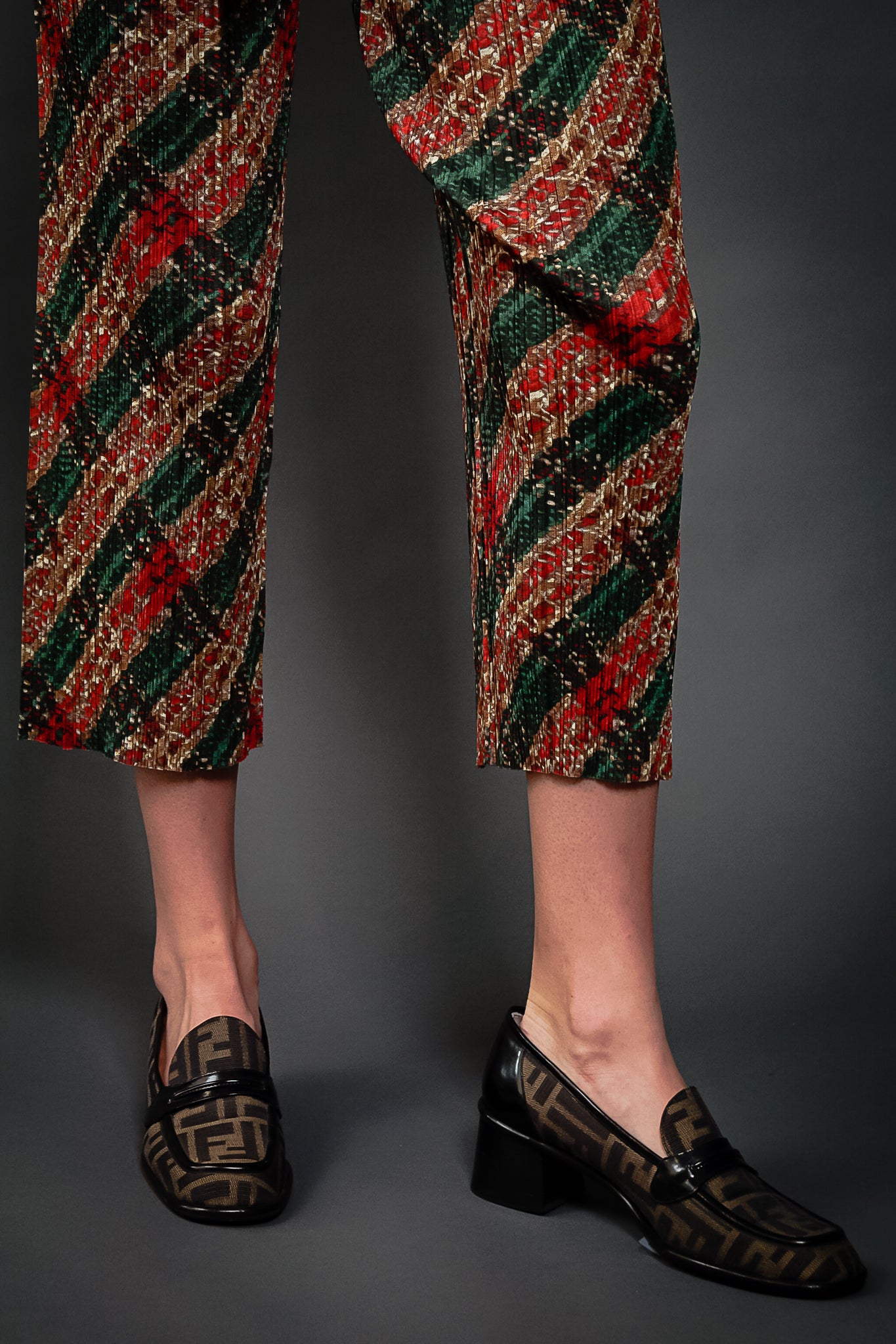 Girl wearing Vintage Pleats Please Issey Miyake Plaid Pant & fendi loafers at Recess Los Angeles