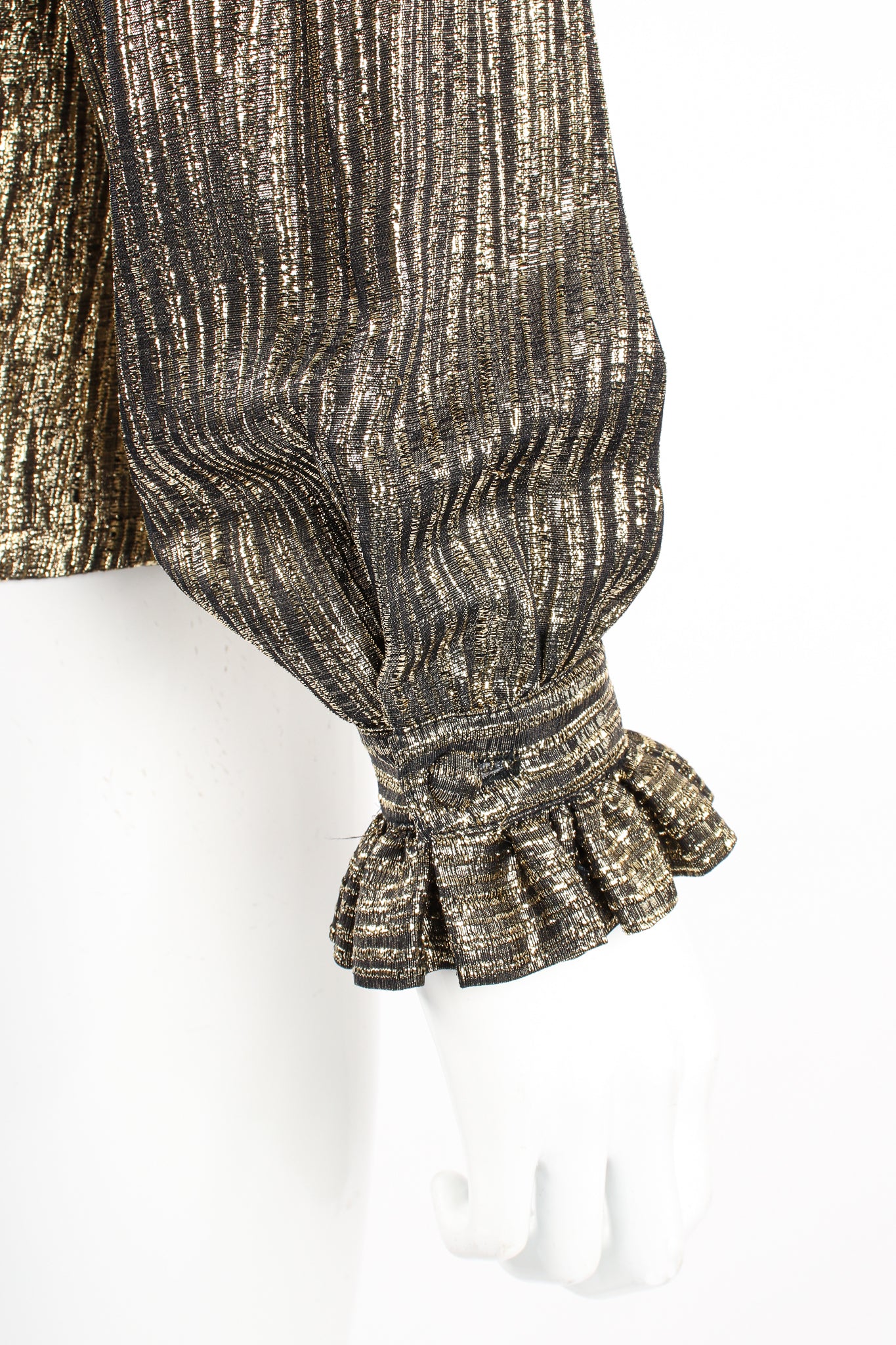 Vintage Adolfo Gold Lamé Ruffle Tie Neck Blouse on Mannequin sleeve cuff at Recess Los Angeles