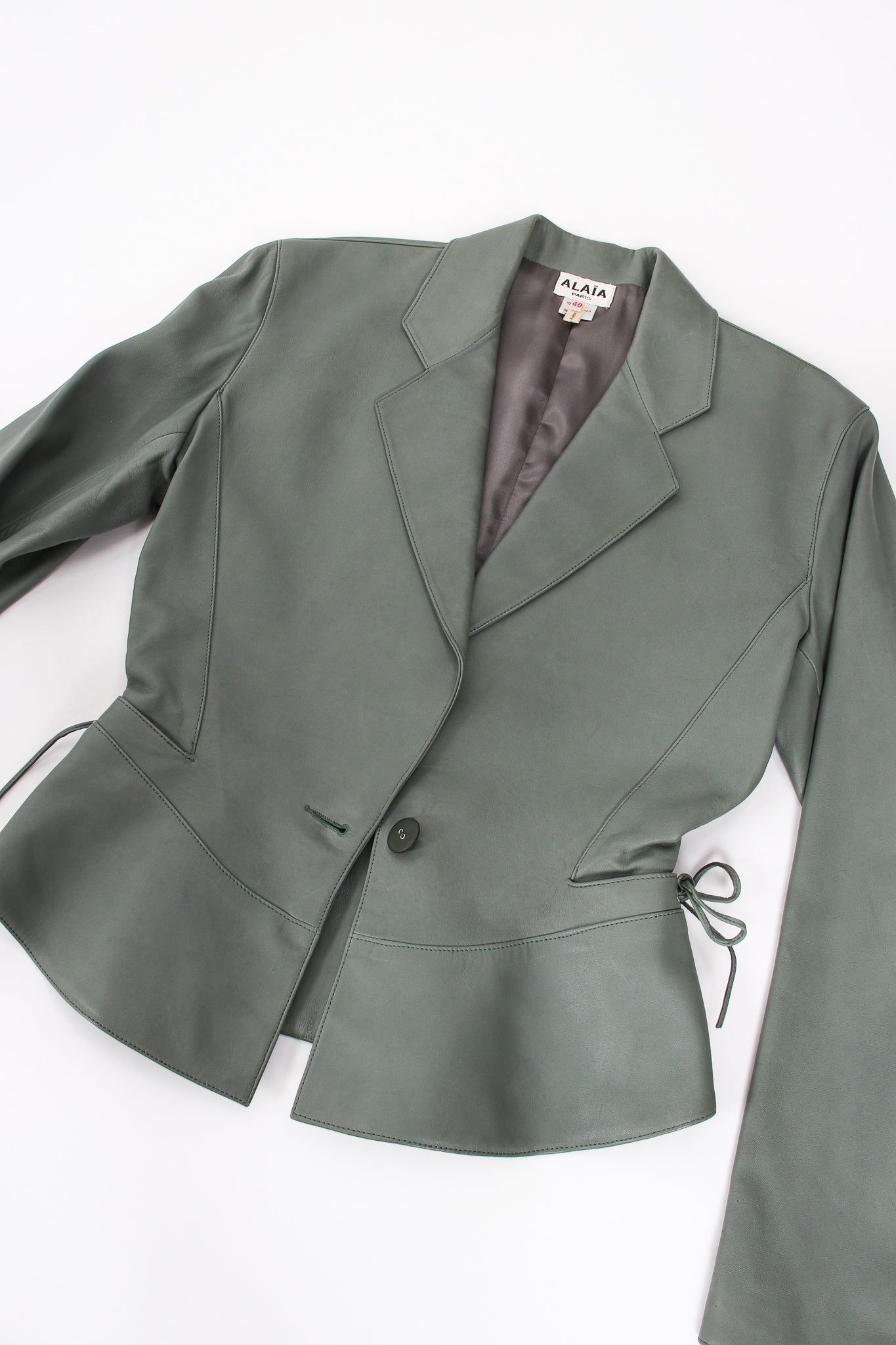 Vintage Alaia Leather  Tie Peplum Jacket flat at Recess Los Angeles