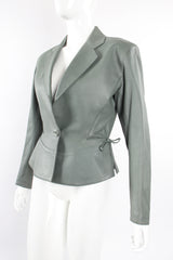 Vintage Alaia Leather Tie Peplum Jacket on Mannequin angle at Recess Los Angeles