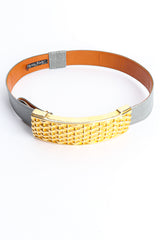 Grey lizard belt with textured gold basket weave buckle by Alexis Kirk fastened flat lay @recessla