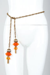 Vintage Unsigned Fiery Orange Beaded Tassel Wrap Necklace Belt on Mannequin waist at Recess