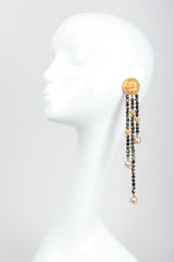 Vintage Carlos Falchi Long Beaded Disc Drop Shoulder Duster Earrings on Mannequin