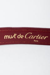 Vintage Cartier Gold Signature stamp on oxblood leather