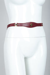 Vintage Cartier Oxblood CC Logo Medallion Leather Belt on mannequin