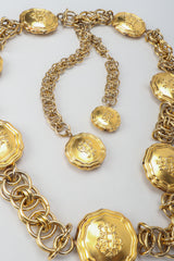 Vintage Emilio Pucci Gold Medallion Logo Chain Belt on grey