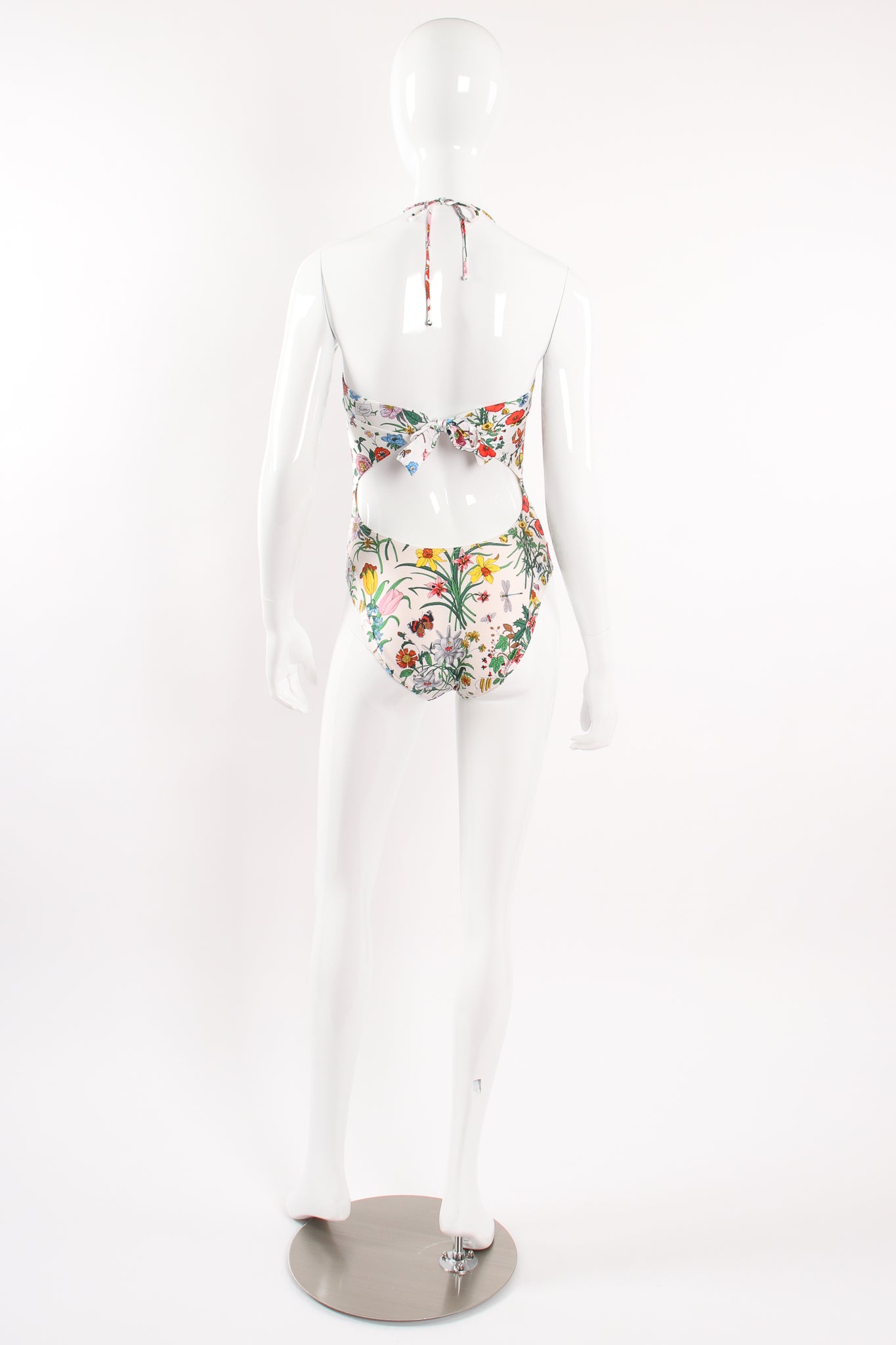 Vintage Gucci Flora Print Maillot Swimsuit on Mannequin back at Recess Los Angeles