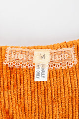 Vintage Hollys Harp lace label on orange jacket