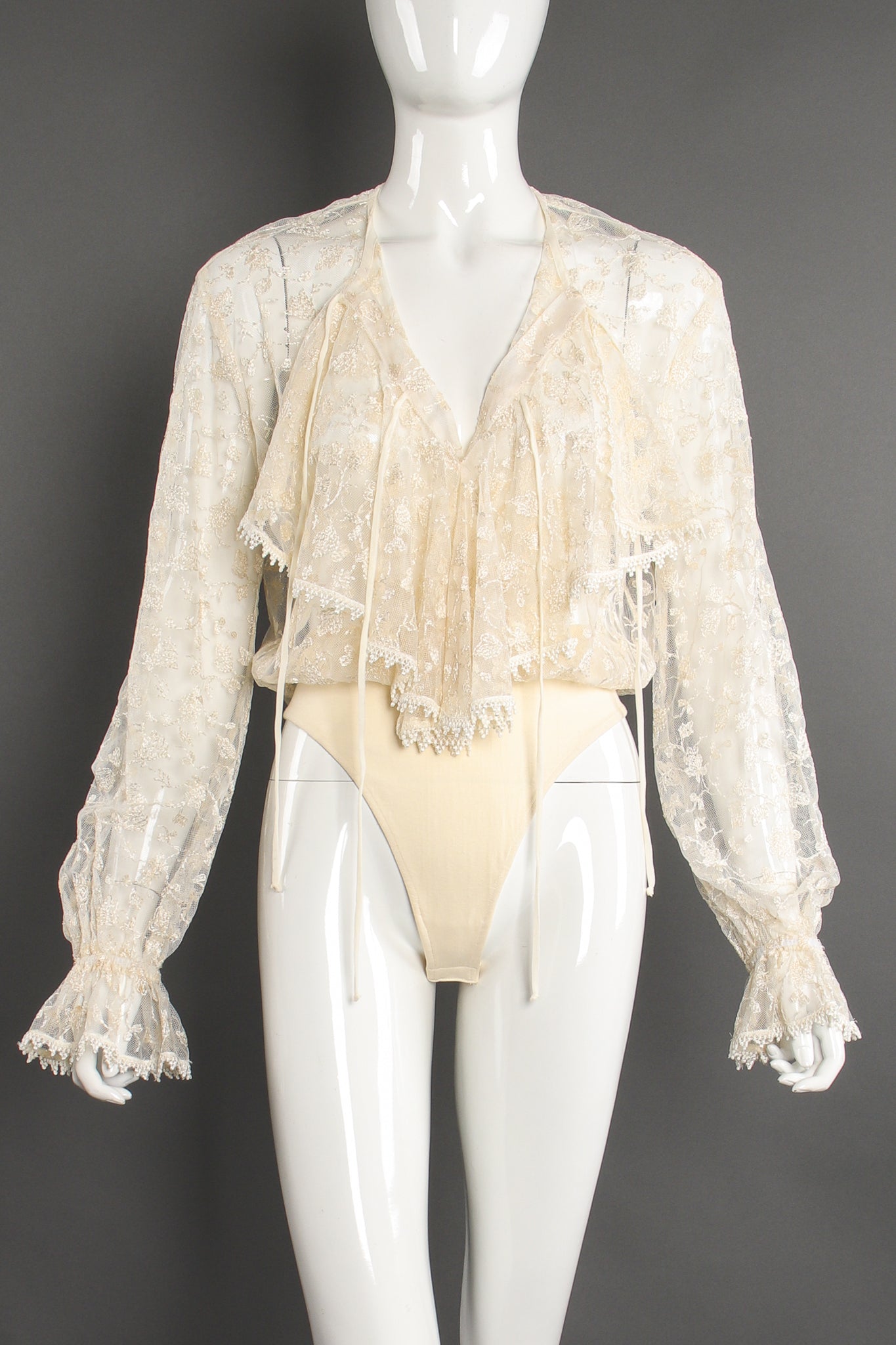 Vintage I.Magnin Sheer Lace Jabot Bodysuit on Mannequin front at Recess Los Angeles