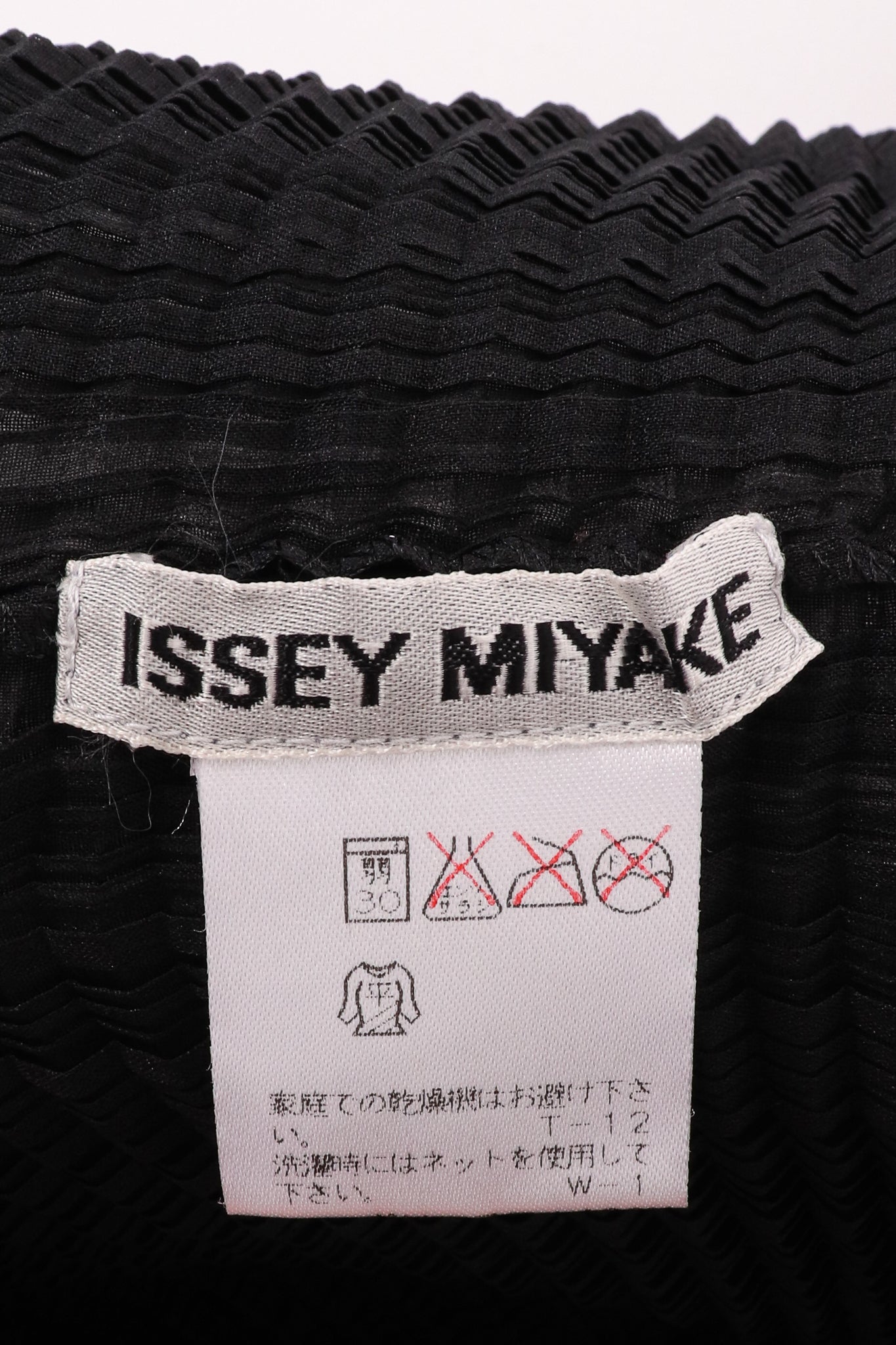 Vintage Issey Miyake Short Sleeve Pleated Turtleneck Top label at Recess Los Angeles