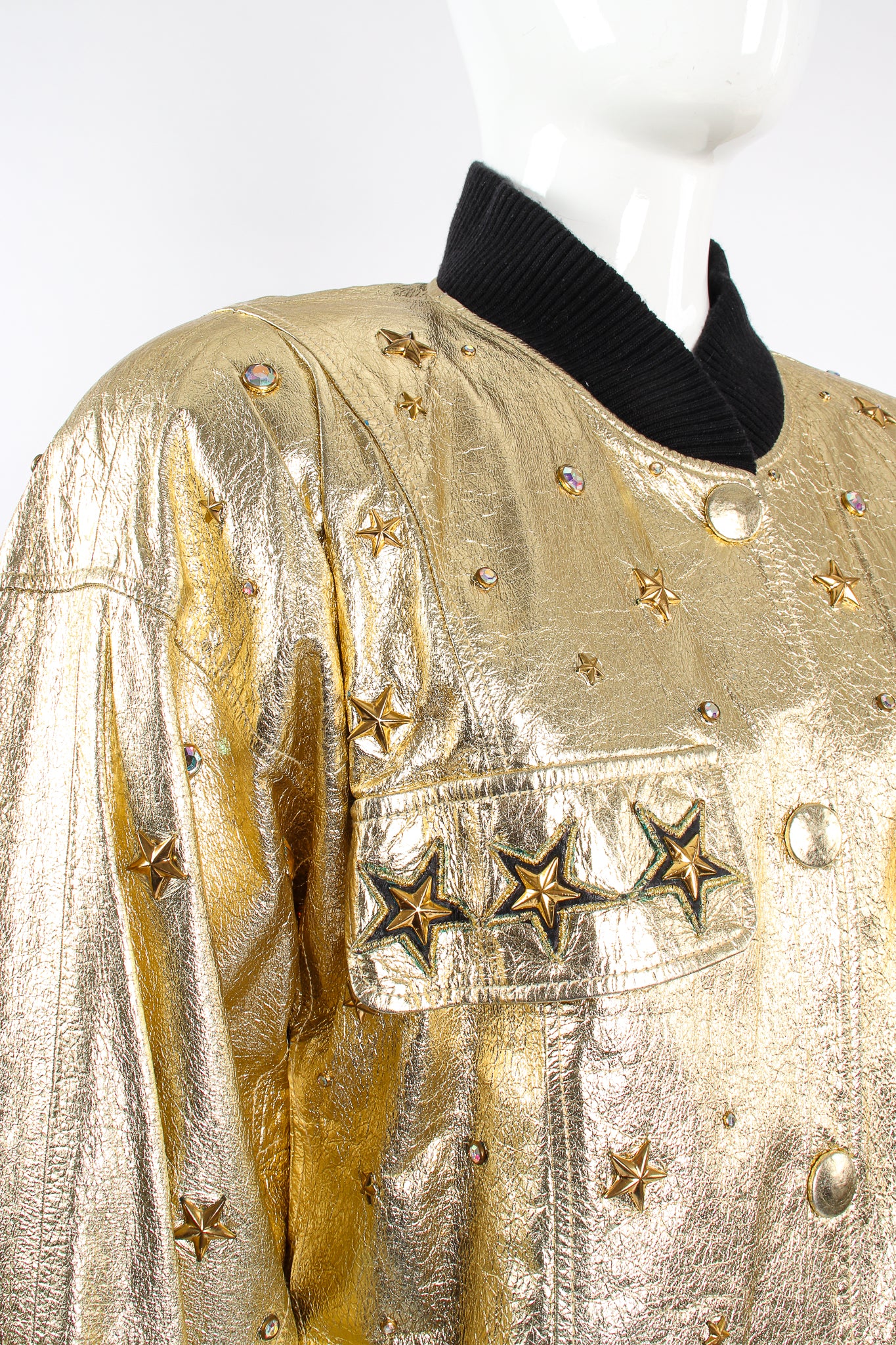 Vintage K.Baumann Studded Gold Leather Bomber Jacket on Mannequin chest at Recess Los Angeles