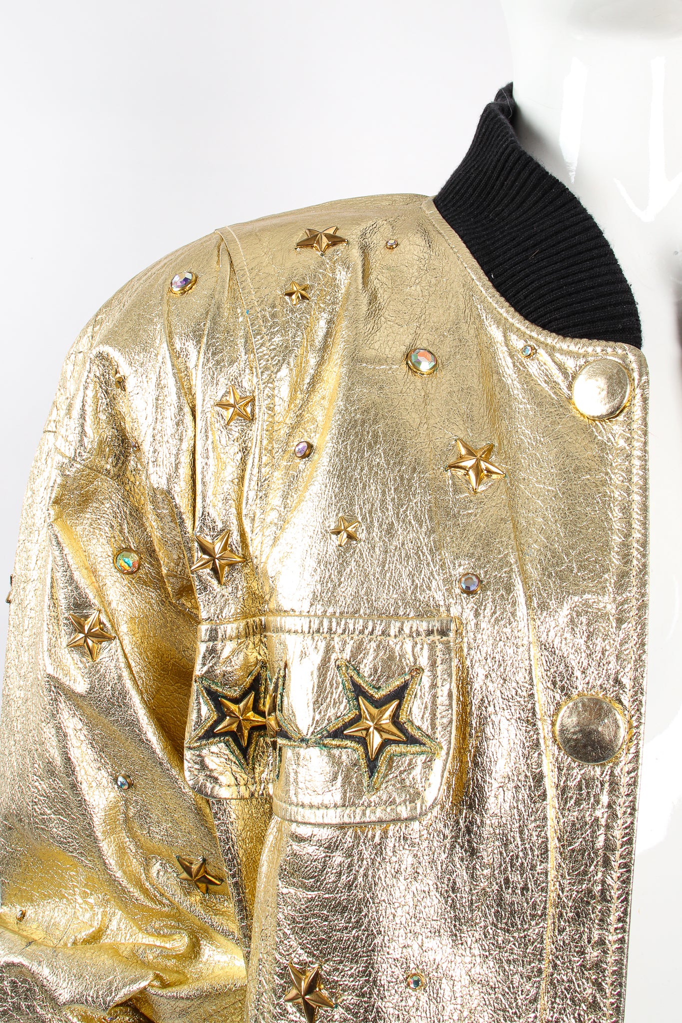 Vintage K.Baumann Studded Gold Leather Bomber Jacket on Mannequin shoulder at Recess Los Angeles