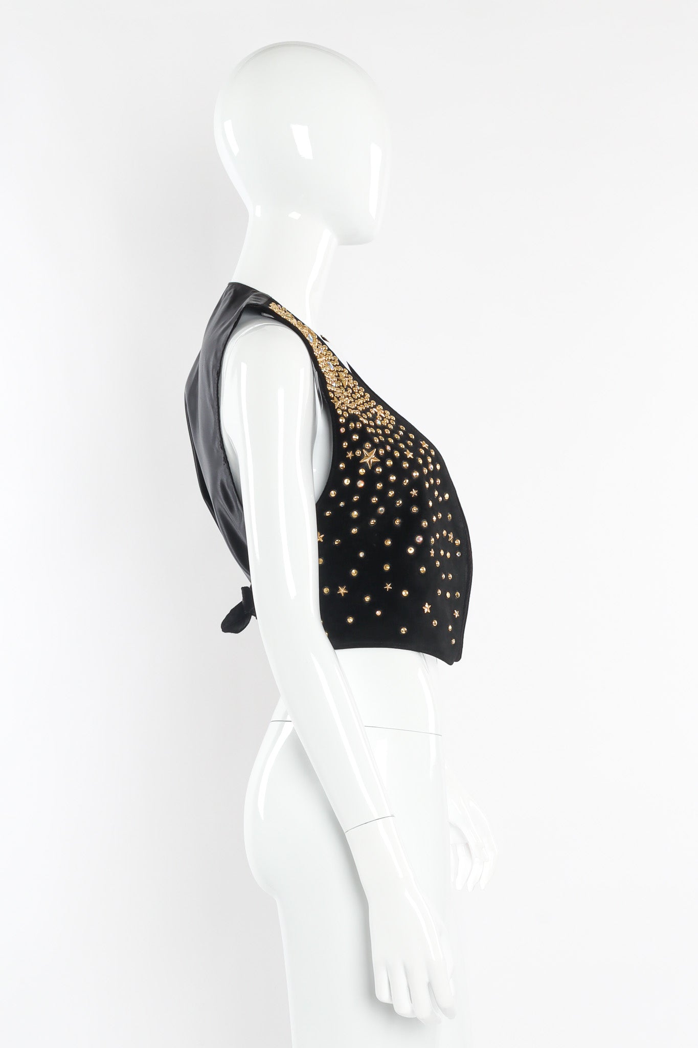 Leather vest with eclectic star and opalescent studs by K. Baumann side mannequin view photo @recessla