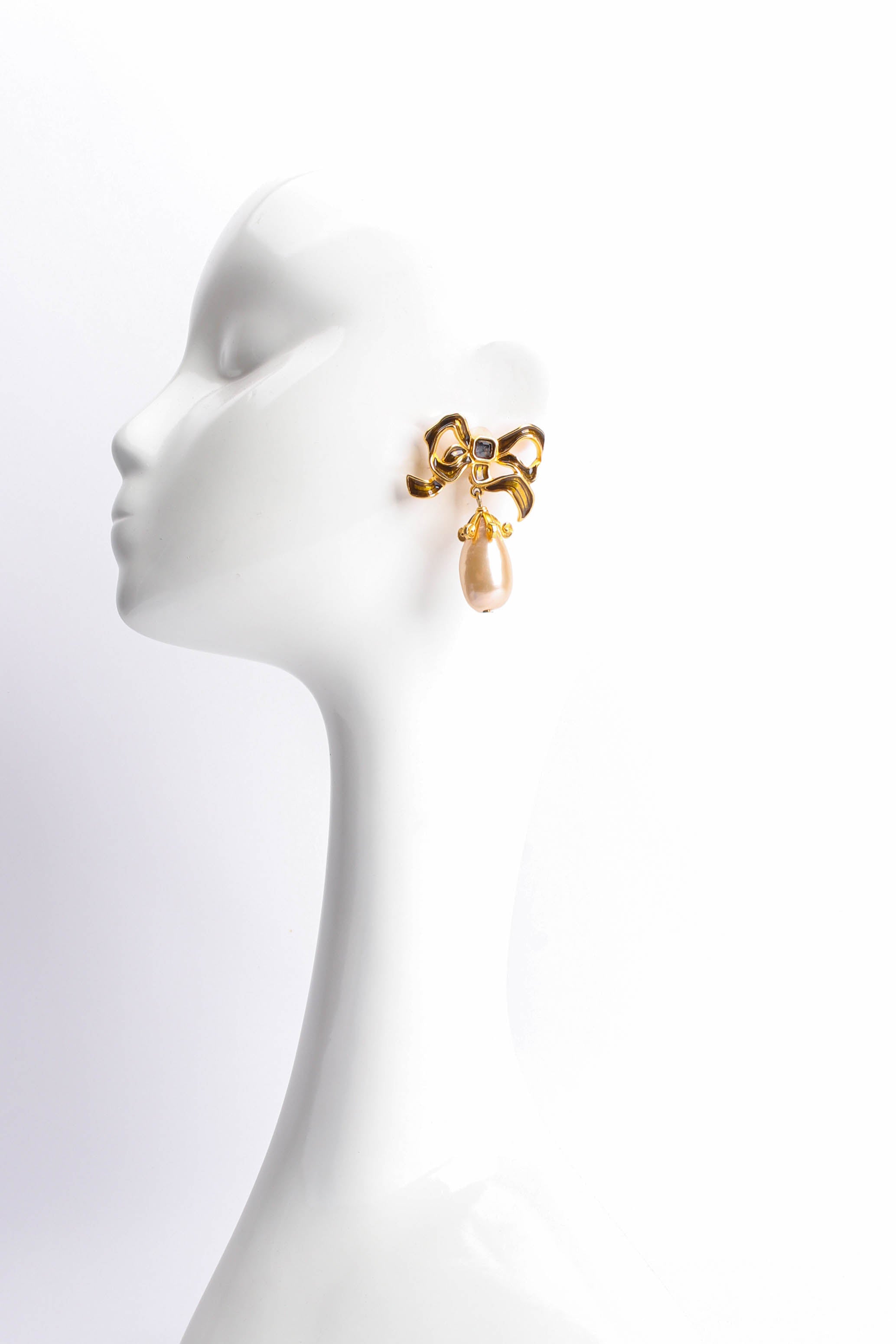 Vintage Karl Lagerfeld Flowy Ribbon Pearl Drop Earrings on mannequin @ Recess LA