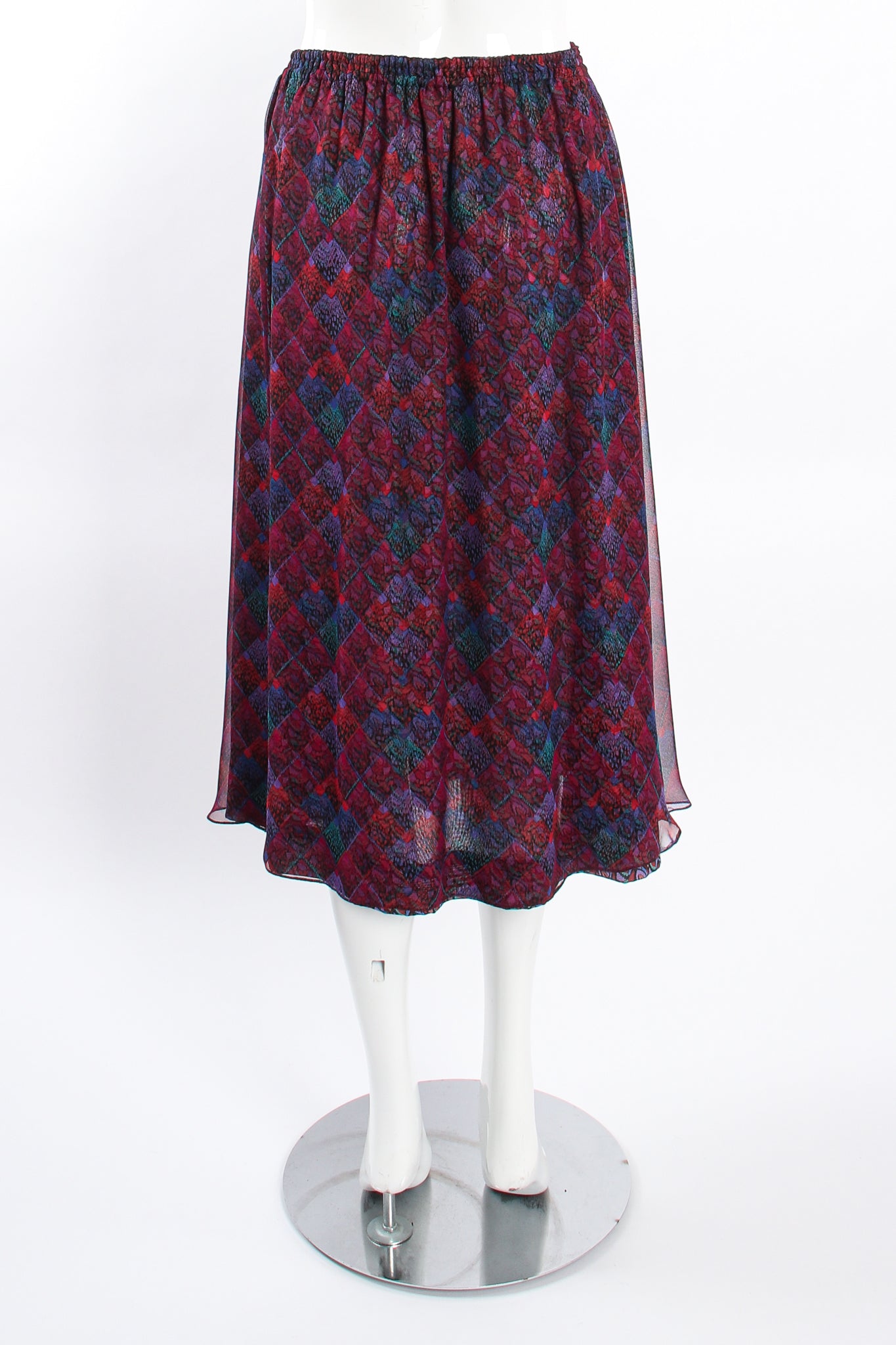 Vintage Koos Van Den Akker Mixed Print Skirt Set on mannequin back at Recess LA