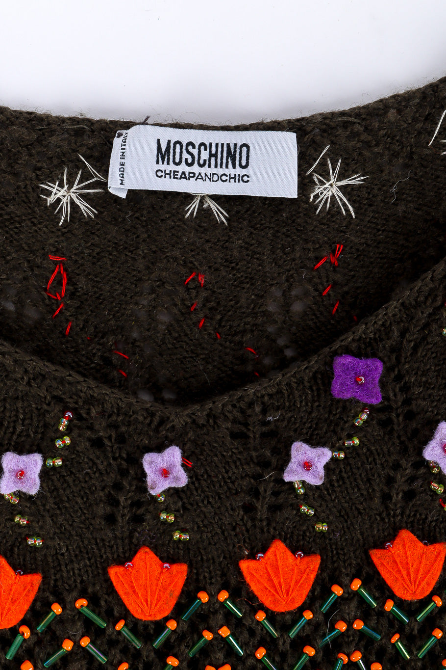 Floral-appliquéd crochet-knit skirt and top by Moschino  designer label photo. @recessla