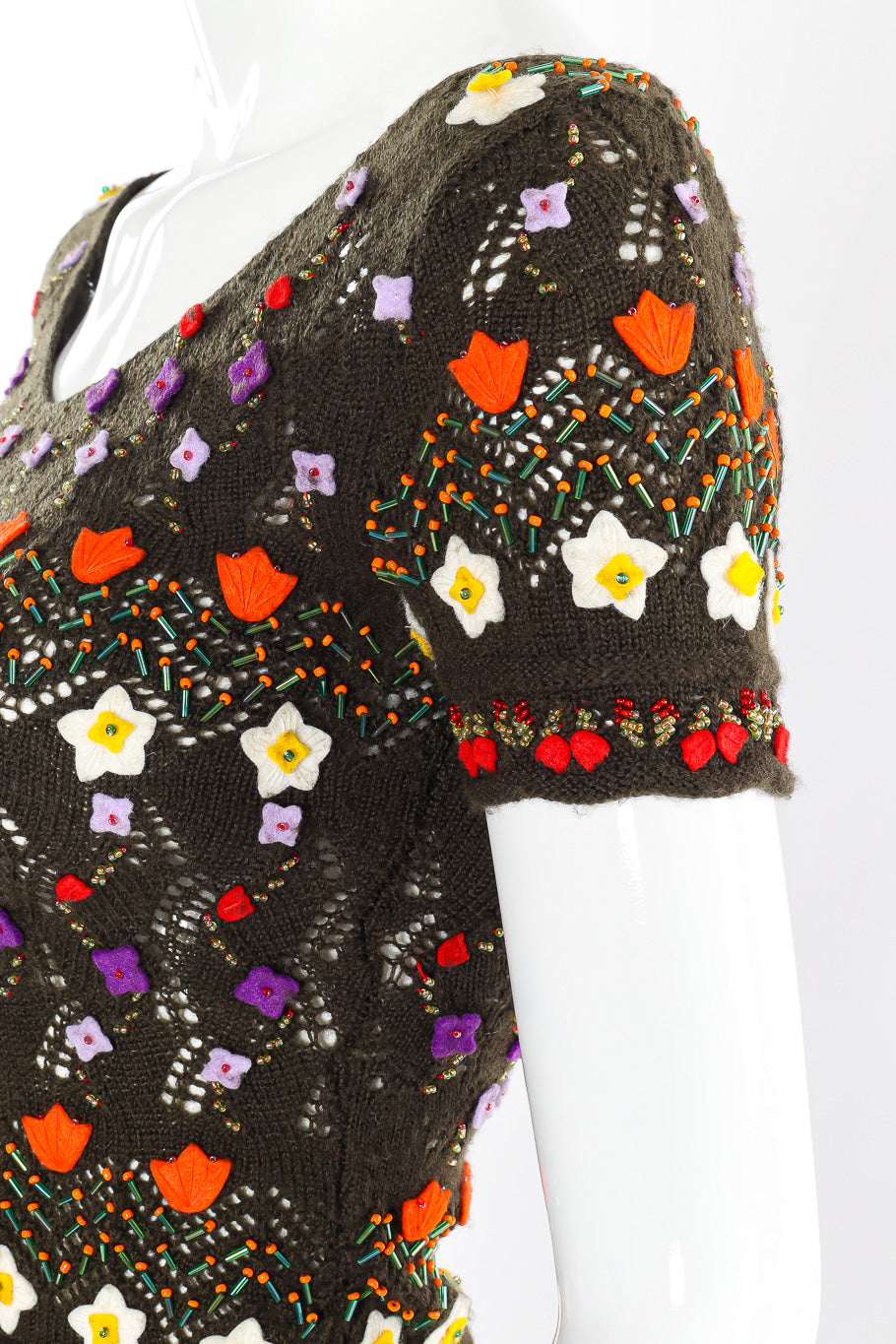 Floral-appliquéd crochet-knit skirt and top by Moschino Appliqué Close-up. @recessla