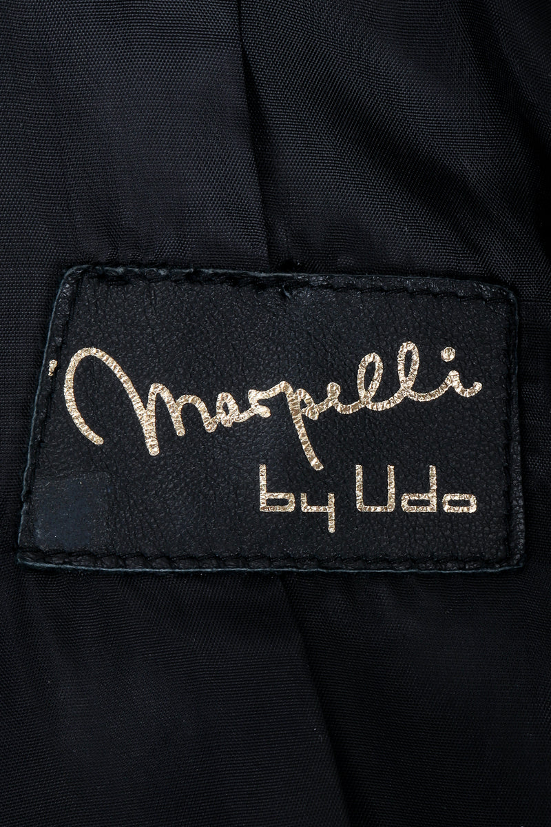 Vintage Marpelli by Udo label on black fabric