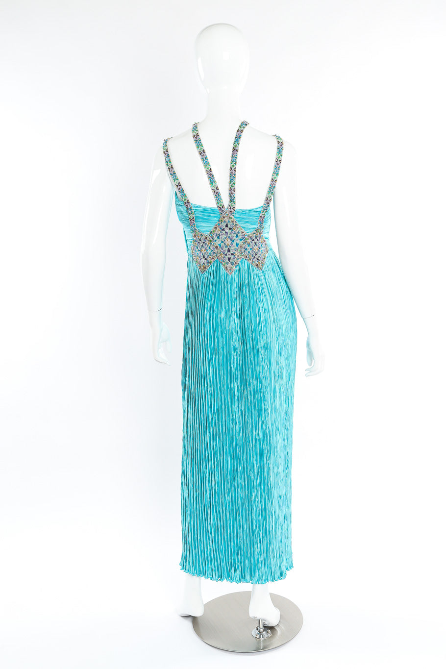 Embellished pleated gown by Mary McFadden on mannequin back full @recessla