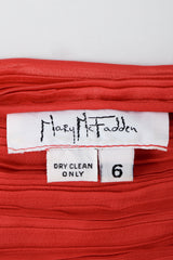 Vintage Mary McFaddden Label on Red Fabric