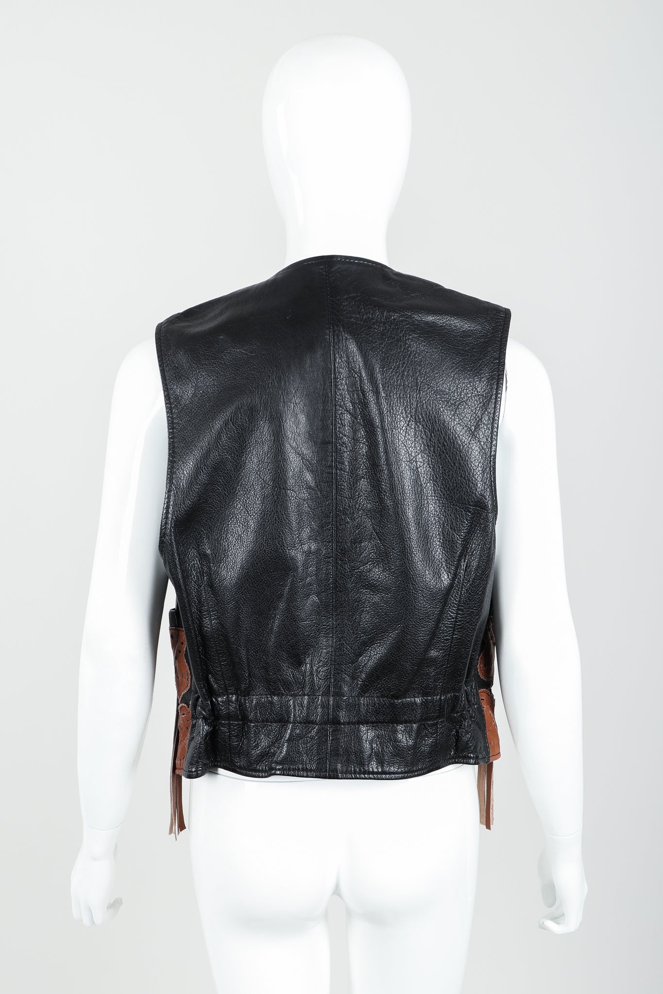 Vintage Moschino Leather Tassel Vest on Mannequin Back at Recess Los Angeles