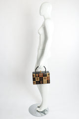 Vintage Murray Kruger Gold Foil European Crest Box Bag on mannequin at Recess Los Angeles