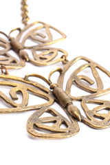 Vintage Brass Double Butterfly Necklace detail at Recess Los Angeles