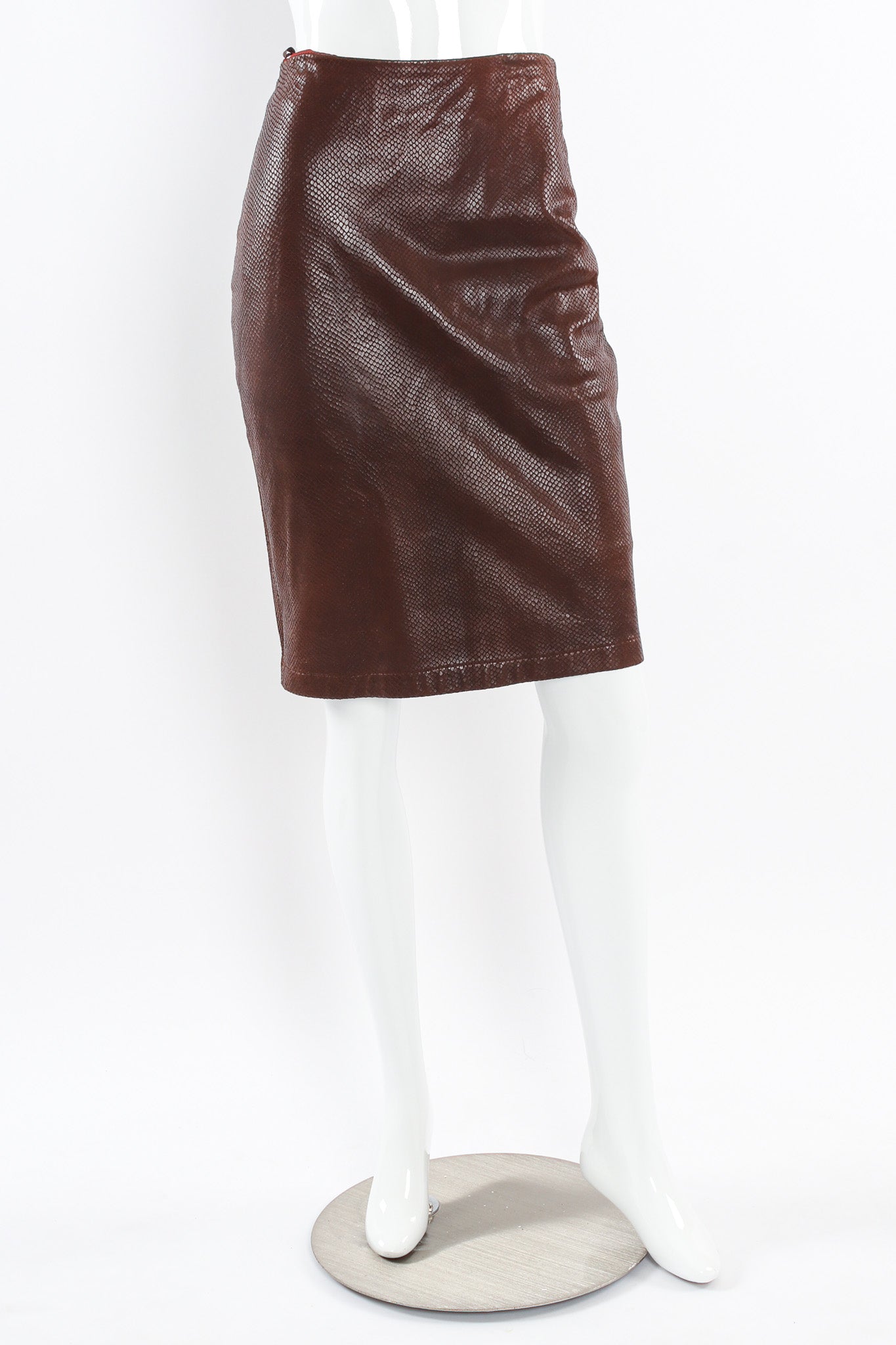 Vintage Omo Norma Kamali Snake Embossed Leather Skirt mannequin front @ Recess LA