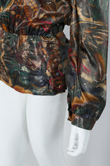 Vintage Paul Louis Orrier Metallic Lamé Dragon Peplum Top on Mannequin at Recess, sleeve view