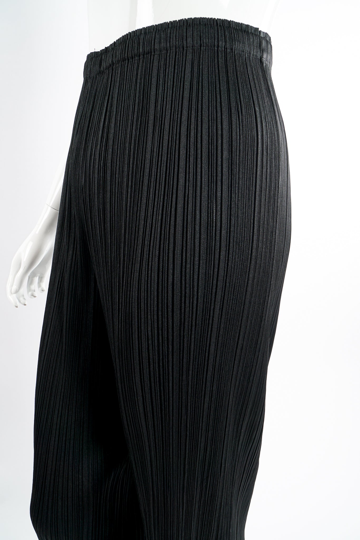 Vintage Issey Miyake Pleats Please Black Pleated Ankle Pant on Mannequin waist at Recess LA