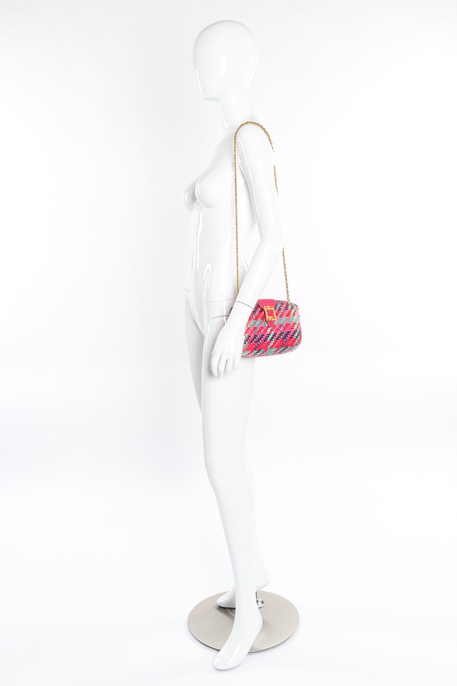 Rodo multicolor woven shoulder clutch on mannequin @recessla