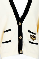 Vintage Sonia Rykiel Cream Knit Letterman Cardigan on Mannequin button placket at Recess