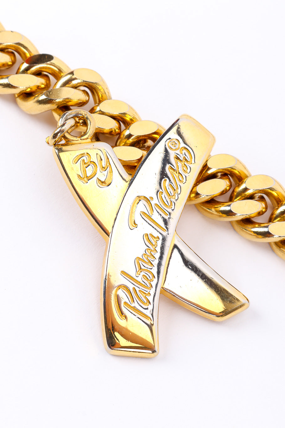 XOXO charm belt by Paloma Picasso on white background signed X logo charm @recessla