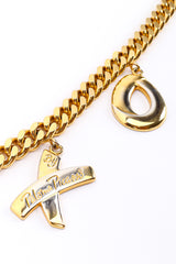 XOXO charm belt by Paloma Picasso on white background X and O charms close @recessla