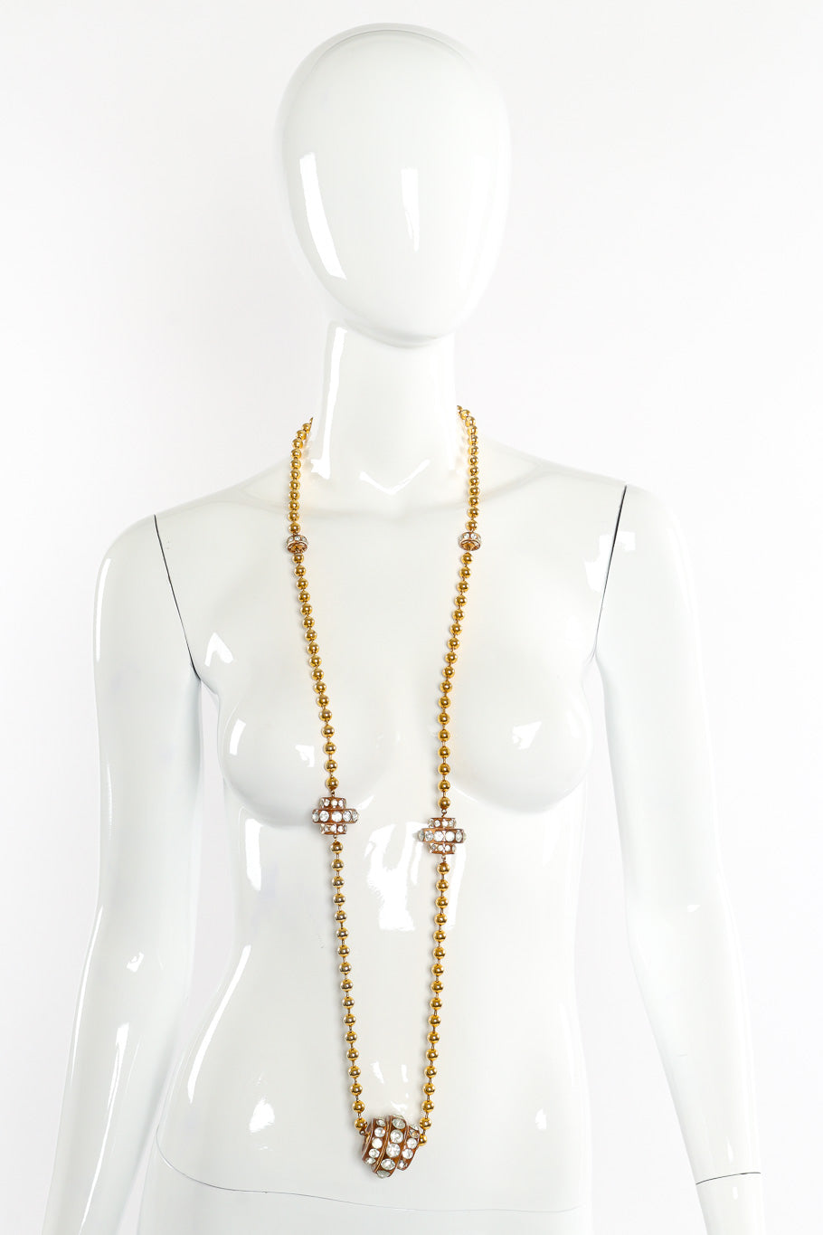Vintage lucite disc necklace on white background around mannequin neck once @recessla