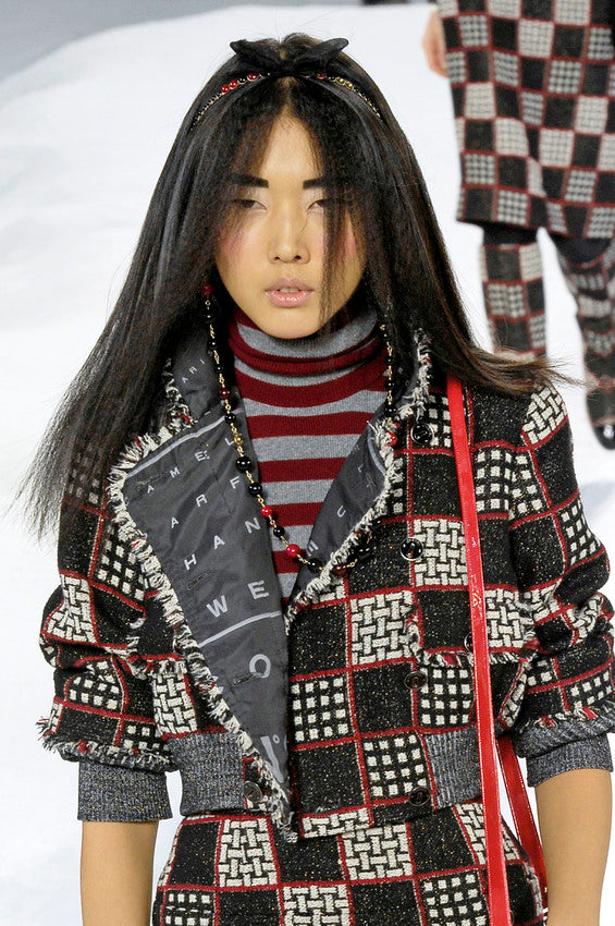 Chanel Tweed Lamé Cropped Jacket on model close up with stripe shirt