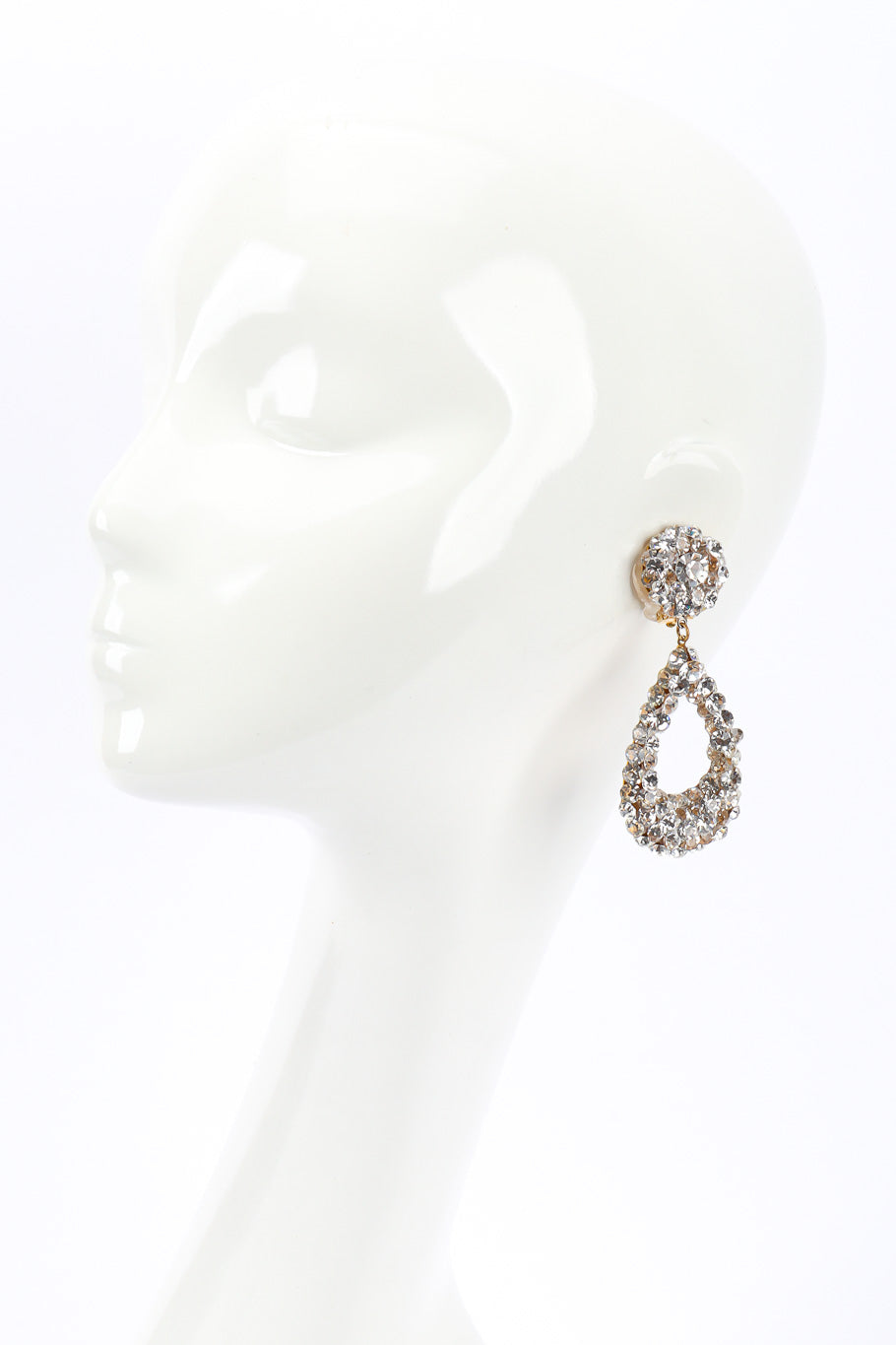 Vintage rhinestone tear-drop earrings on white background on mannequin head @recessla