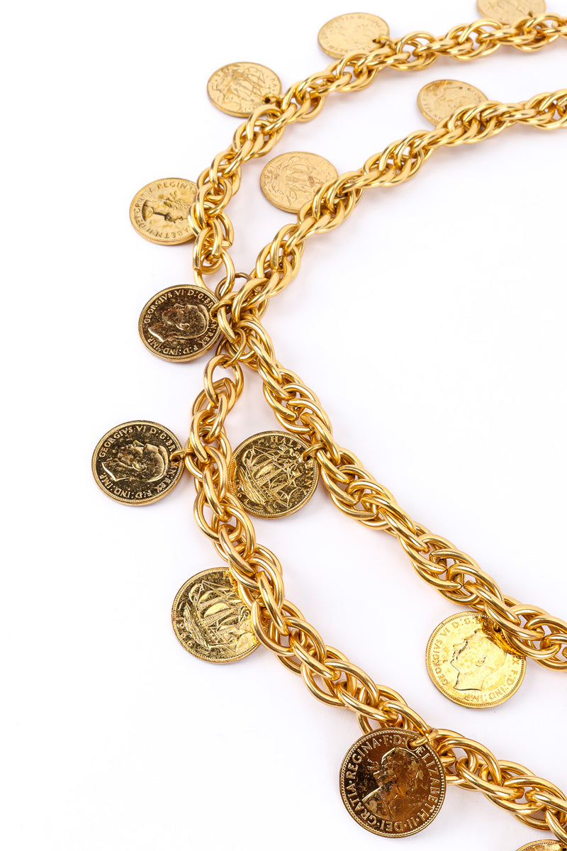 Chain link belt with coin charms on white background center rows close @recessla