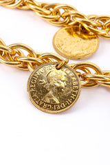 Chain link belt with coin charms on white background coin front close @recessla