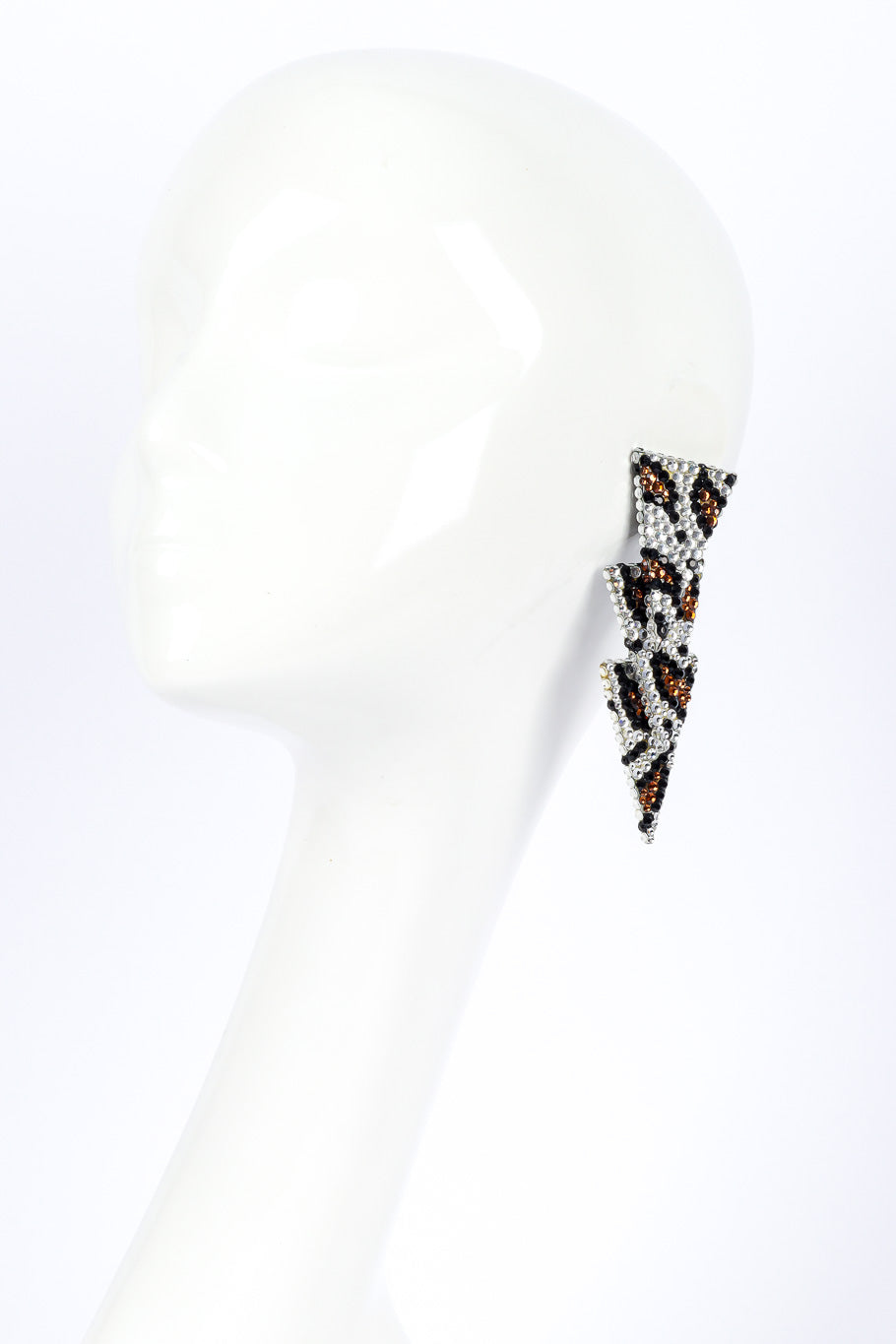 Spear drop earrings by Richard Kerr on white background on mannequin @recessla