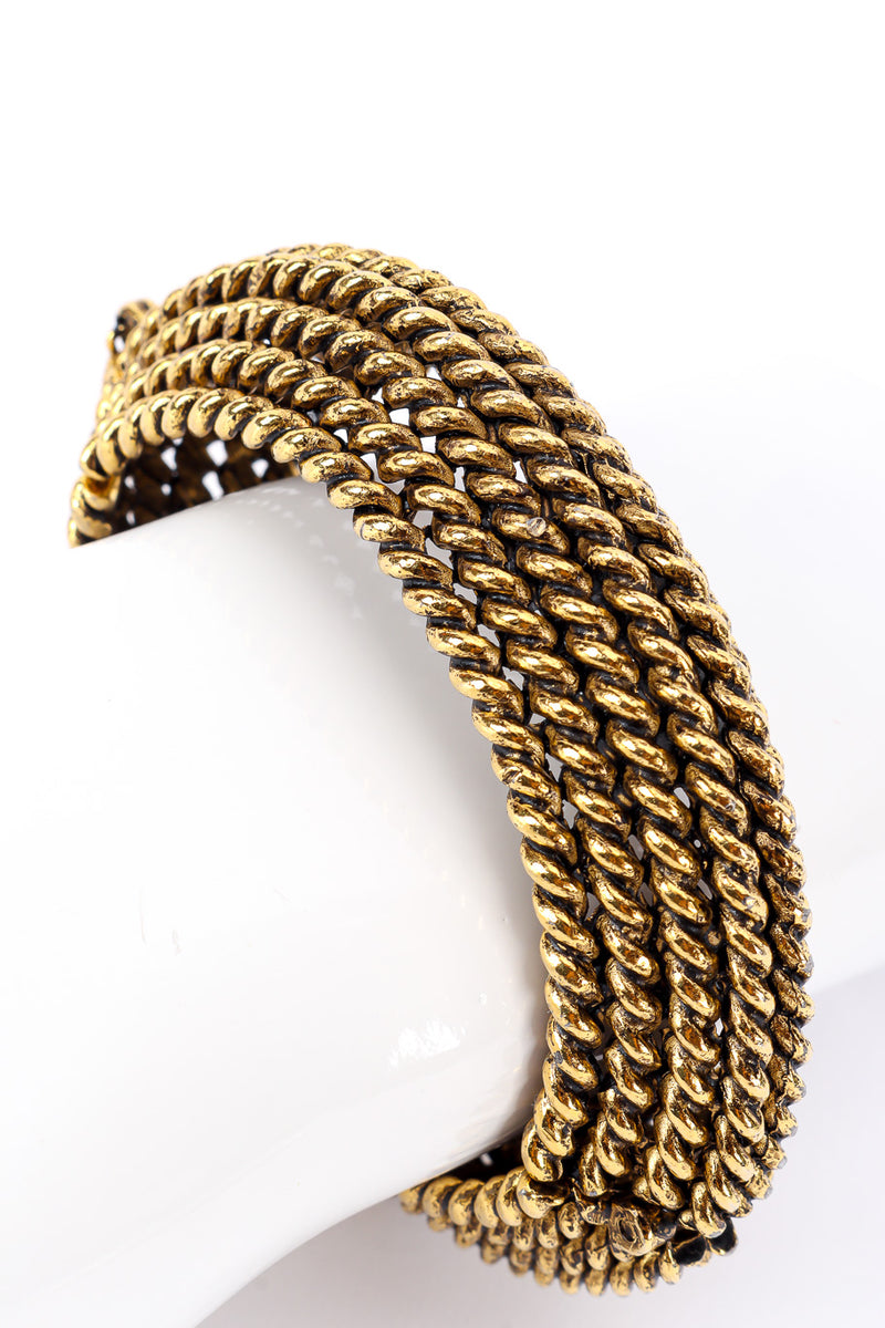 Cuff bracelet by Kenneth Jay Lane on white background on mannequin wrist close  @recessla