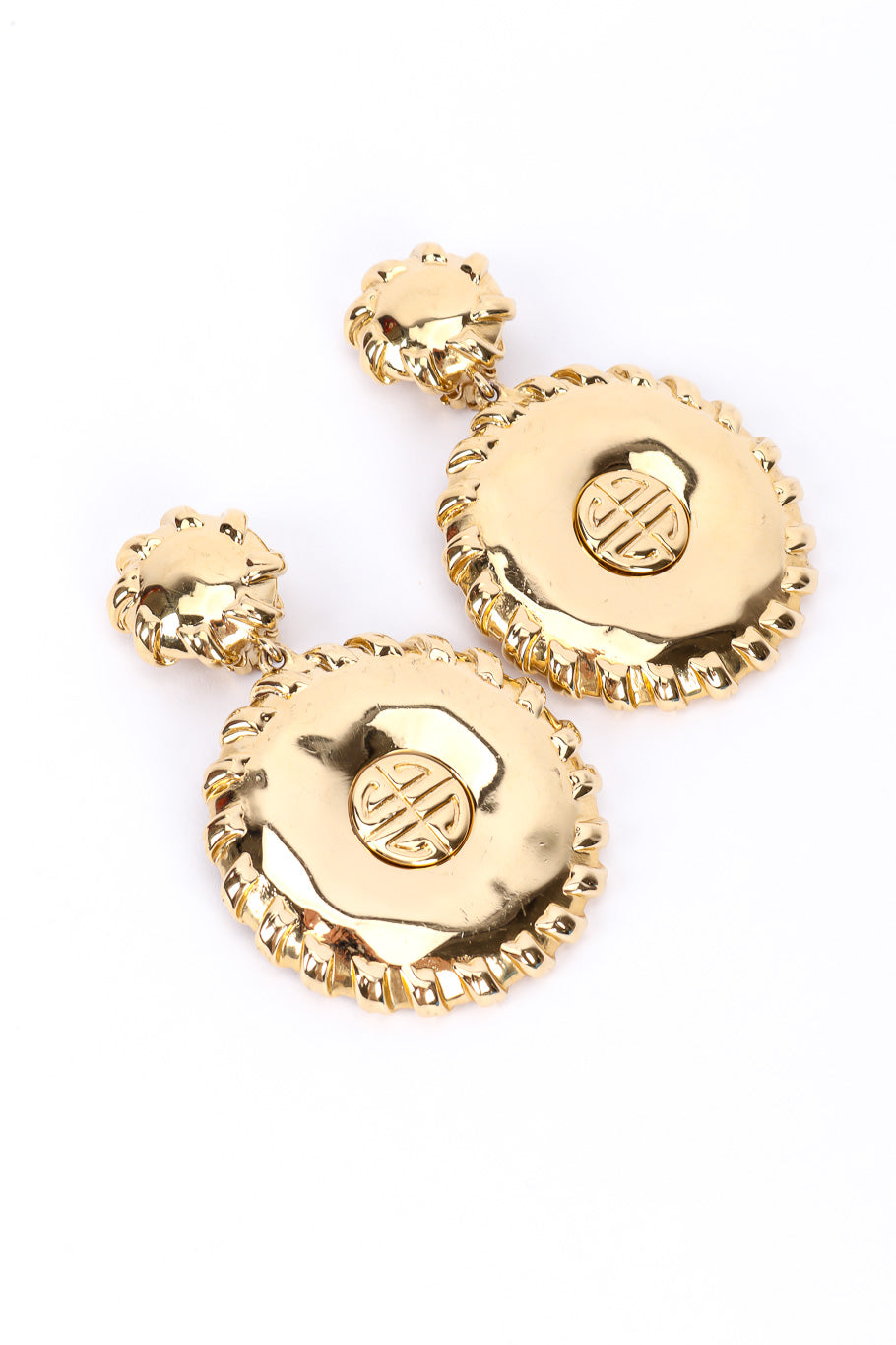 Medallion drop earrings by Givenchy side by side on white background @recessla