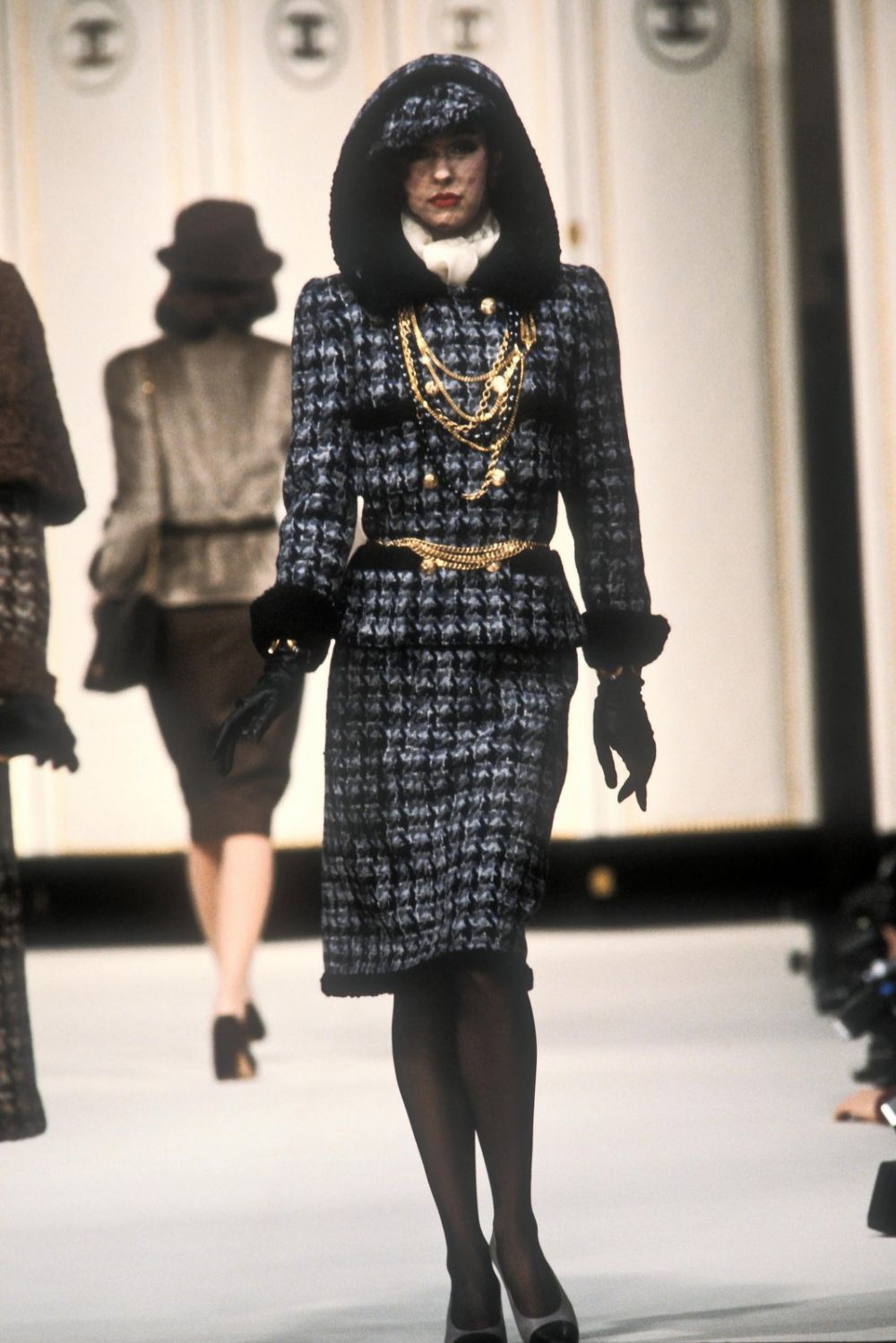 Knot Closure Bouclé Set by Chanel print and color on model on 1983 runway