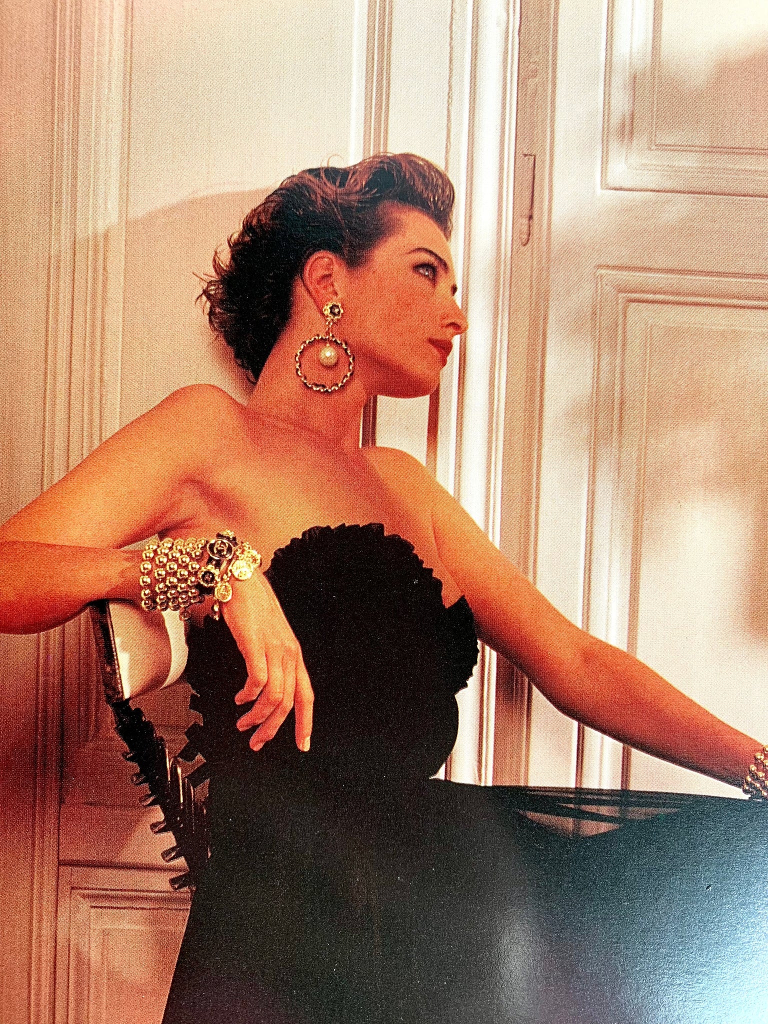 Leather chain hoop earrings by Chanel from 1992 Cruise Collection catalog 