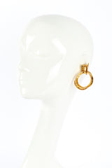 Antigona Paris Hammered Drop Hoop Earrings on mannequin @RECESS LA