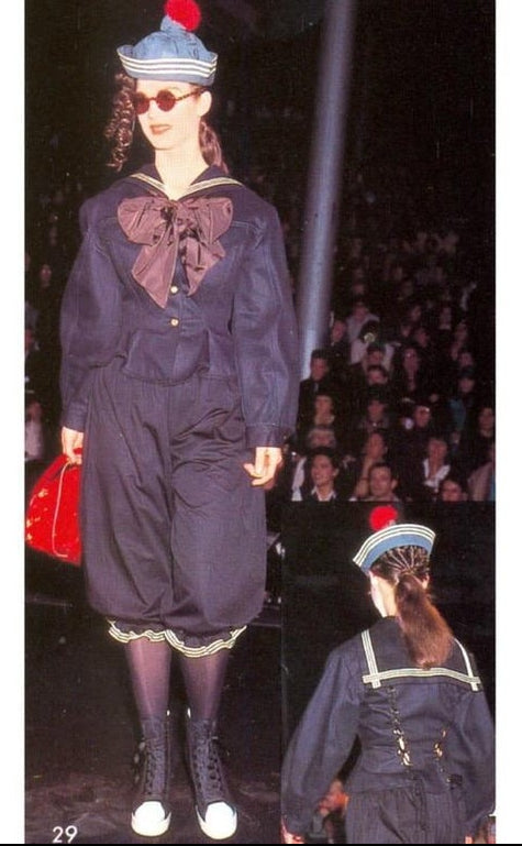 Sailor peplum jacket on model on 1989 runway in navy
