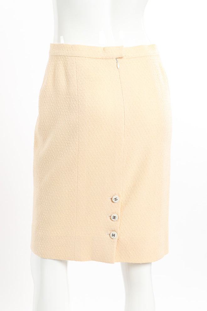 Chanel Knit Bouclé Jacket and Skirt Set skirt back on mannequin closeup @recessla