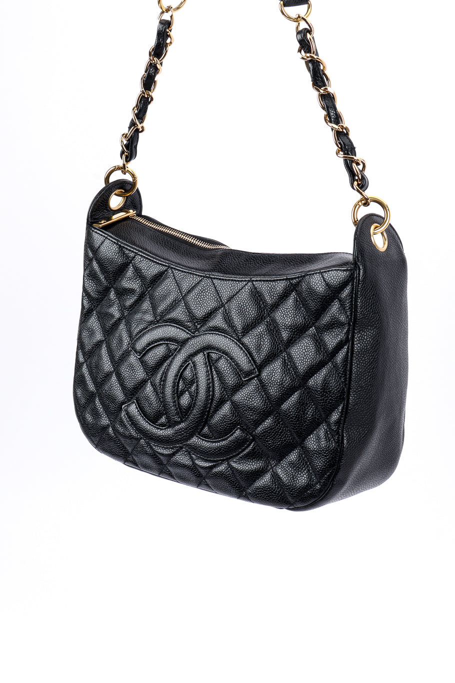 Chanel Quilted CC Shoulder Bag 3/4 front suspended by strap @recess la