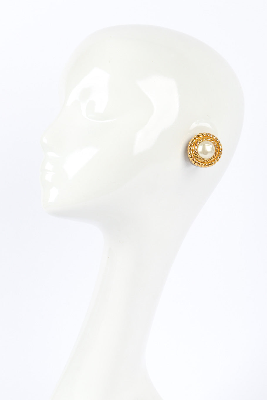 Rope Frame Pearl Earrings by Chanel on white background on mannequin head @recessla