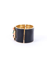 Maltese cross cuff bracelet by Ciner on white background side hinge @recessla